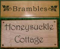 wooden house signs